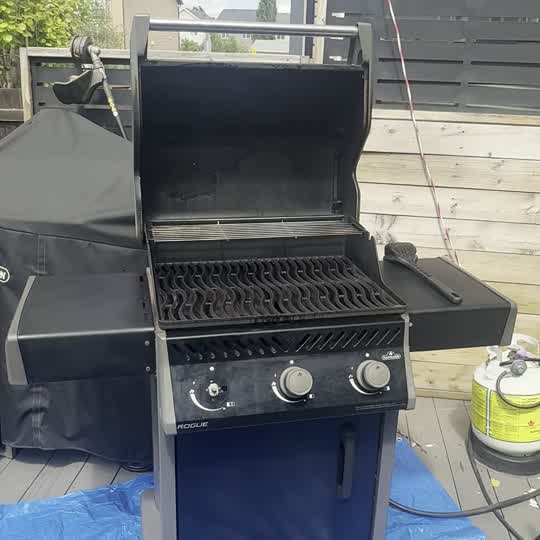 Finished barbecue after cleaning, reassembled and ready to cook on